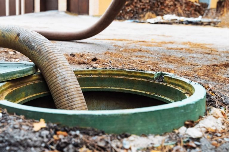 pumping out sewage from a septic tank